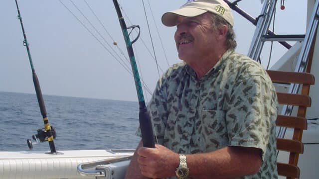 man relaxing while fishing in va beach